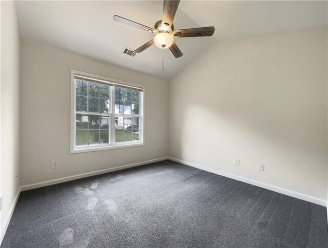 6001 Deer Springs Ln NW, Acworth, GA 30101 - empty room with dark carpet, a ceiling fan, baseboards, and lofted ceiling