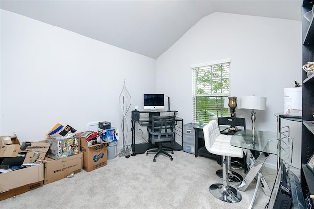 office area featuring carpet flooring and lofted ceiling