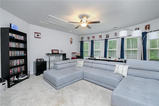 living room with carpet and ceiling fan