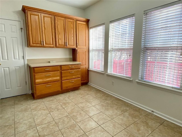 interior space with light tile patterned floors