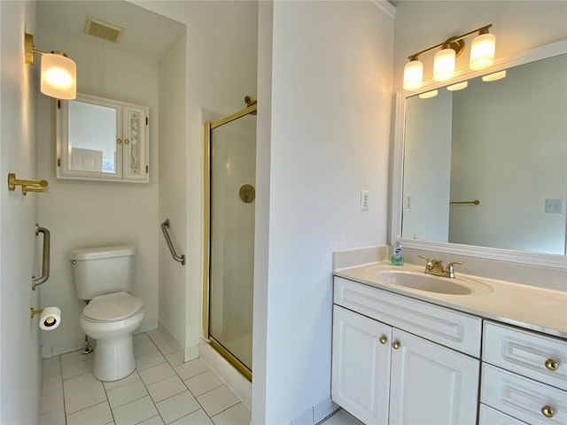 bathroom featuring vanity, an enclosed shower, tile patterned floors, and toilet