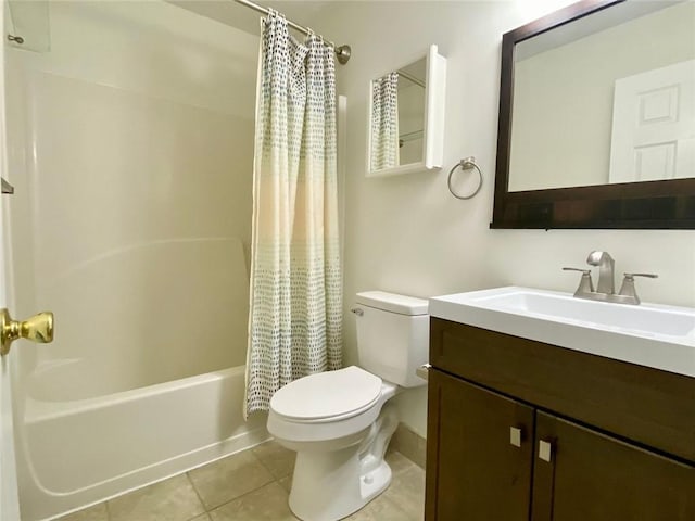 full bathroom featuring tile patterned floors, toilet, vanity, and shower / bath combo