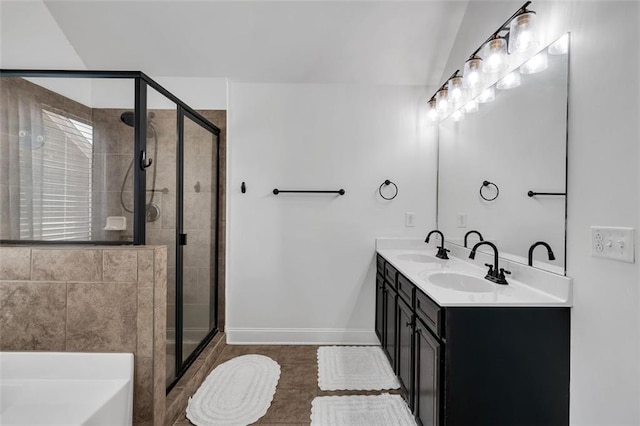 bathroom featuring tile patterned floors, vanity, and independent shower and bath