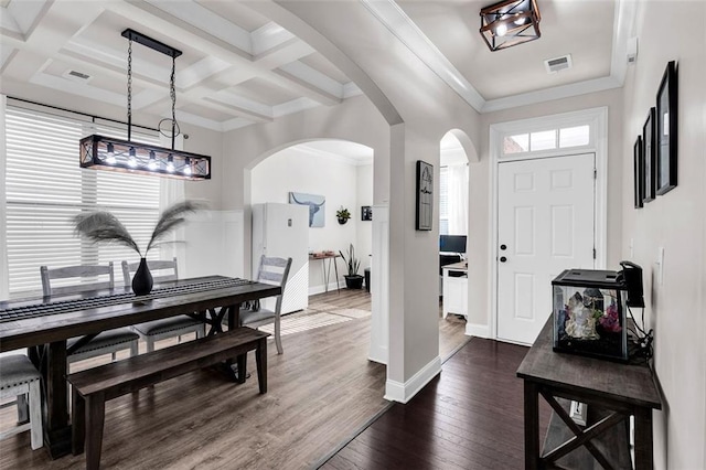 foyer featuring beamed ceiling, dark hardwood / wood-style flooring, crown molding, and coffered ceiling