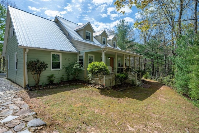 306 Pig Trl, Cherry Log, GA 30522 - view of front of home featuring a porch, metal roof, and a front yard