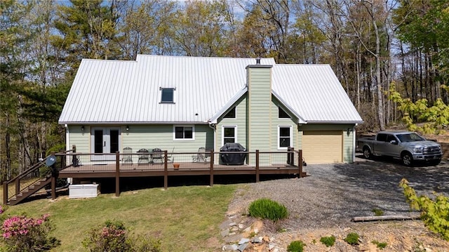 306 Pig Trl, Cherry Log, GA 30522 - back of property featuring a garage, a deck, french doors, a chimney, and a lawn