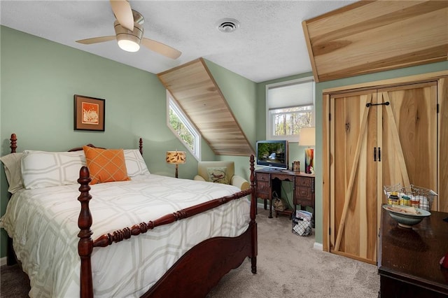306 Pig Trl, Cherry Log, GA 30522 - bedroom with multiple windows, light carpet, ceiling fan, and visible vents