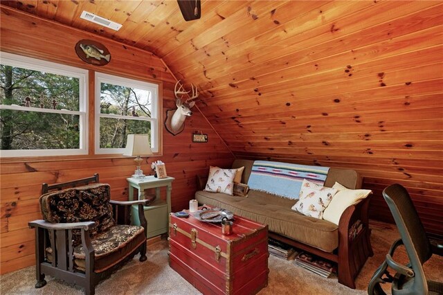 306 Pig Trl, Cherry Log, GA 30522 - living area with wooden walls, carpet flooring, visible vents, vaulted ceiling, and wood ceiling