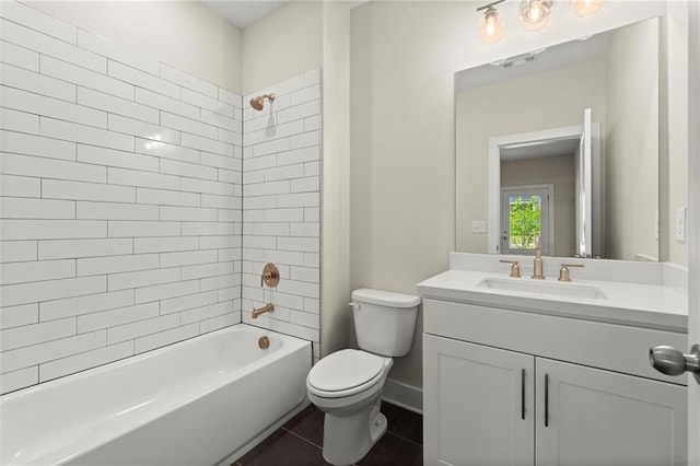 1417 Coretta Scott Bnd, Atlanta, GA 30318 - bathroom with toilet, vanity, bathtub / shower combination, and tile patterned floors
