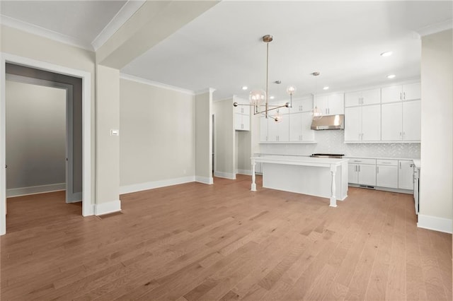 1417 Coretta Scott Bnd, Atlanta, GA 30318 - unfurnished living room with ornamental molding, baseboards, a chandelier, light wood-style floors, and recessed lighting