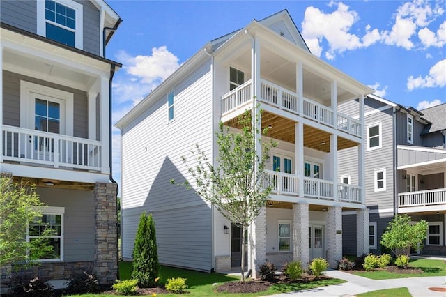 1417 Coretta Scott Bnd, Atlanta, GA 30318 - view of front of home featuring a balcony