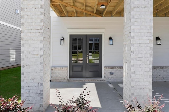 1417 Coretta Scott Bnd, Atlanta, GA 30318 - doorway to property with french doors and brick siding