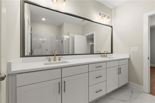 1417 Coretta Scott Bnd, Atlanta, GA 30318 - bathroom featuring double vanity, a marble finish shower, baseboards, and marble finish flooring