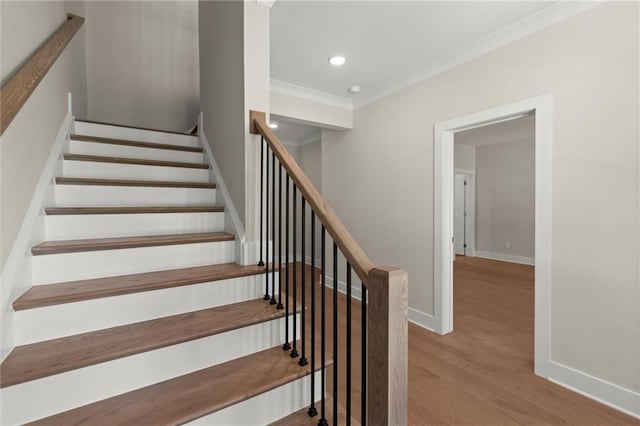 1417 Coretta Scott Bnd, Atlanta, GA 30318 - stairway with wood finished floors, crown molding, recessed lighting, and baseboards
