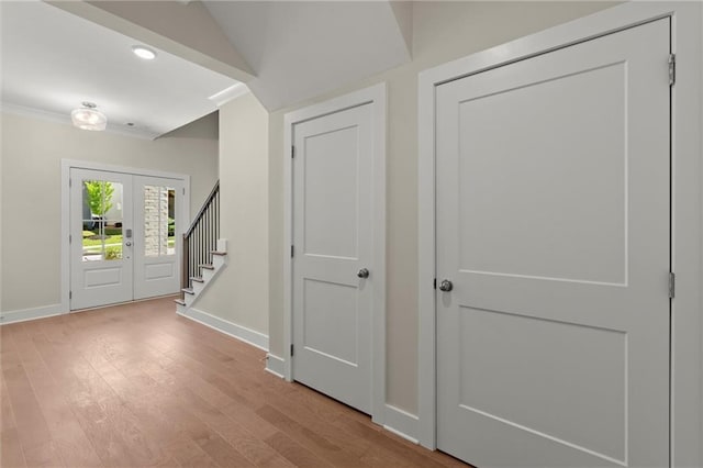 1417 Coretta Scott Bnd, Atlanta, GA 30318 - foyer with baseboards, wood finished floors, stairs, french doors, and recessed lighting