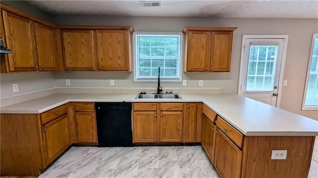 4373 Abram Dr, Conley, GA 30288 - kitchen with dishwasher, a peninsula, a sink, brown cabinets, and light countertops