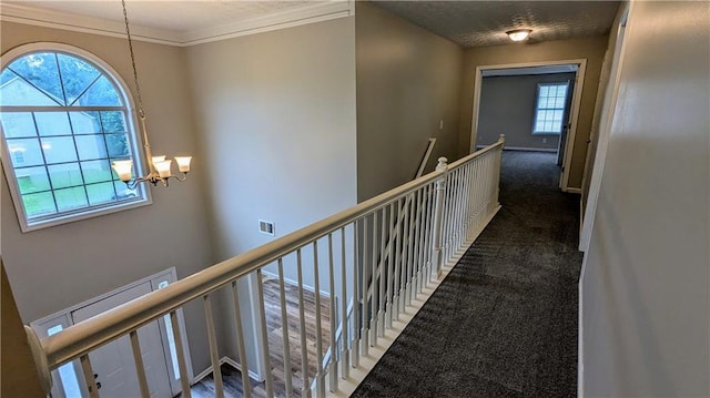 4373 Abram Dr, Conley, GA 30288 - hall featuring a chandelier, an upstairs landing, carpet flooring, and ornamental molding