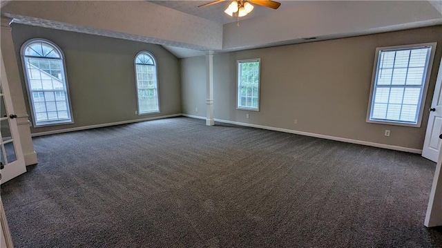 4373 Abram Dr, Conley, GA 30288 - empty room with ceiling fan, healthy amount of natural light, baseboards, and lofted ceiling