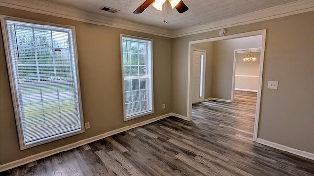 4373 Abram Dr, Conley, GA 30288 - spare room featuring ornamental molding, dark wood finished floors, baseboards, and ceiling fan
