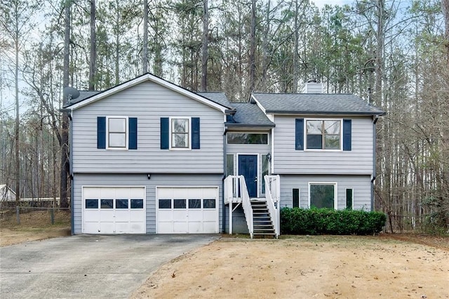 raised ranch featuring a garage