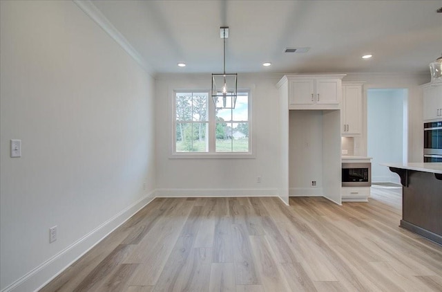 unfurnished living room with light wood-style flooring, recessed lighting, visible vents, and baseboards