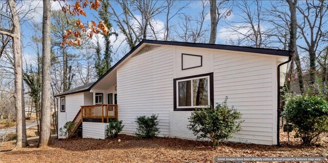 view of side of property featuring a garage