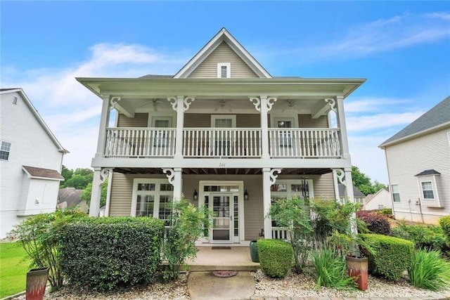 266 Monarch Village Way, Stockbridge, GA 30281 - view of front of house with a balcony, covered porch, and a ceiling fan
