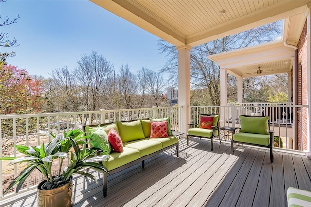 deck featuring outdoor lounge area