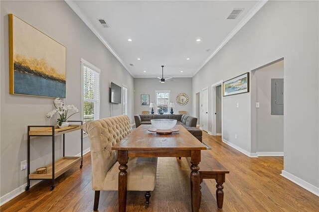 459 James P Brawley Dr NW, Atlanta, GA 30318 - dining area with baseboards, ceiling fan, visible vents, and wood finished floors