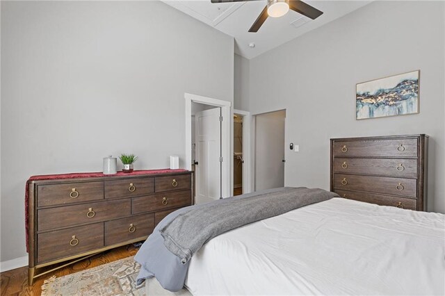 459 James P Brawley Dr NW, Atlanta, GA 30318 - bedroom featuring baseboards, high vaulted ceiling, ceiling fan, and wood finished floors