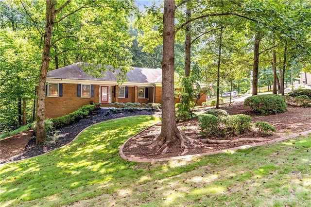 2166 Lake Ridge Ter, Lawrenceville, GA 30043 - ranch-style house with a front yard and brick siding
