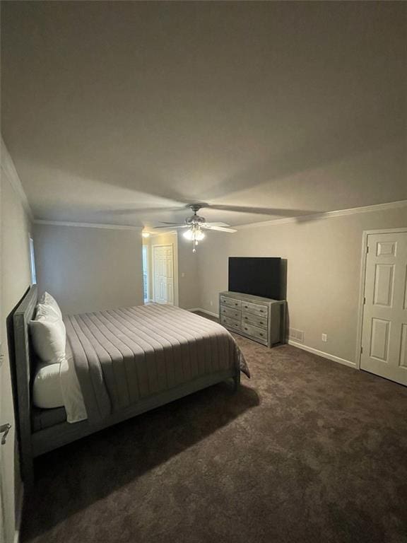 2166 Lake Ridge Ter, Lawrenceville, GA 30043 - carpeted bedroom featuring crown molding, baseboards, and ceiling fan