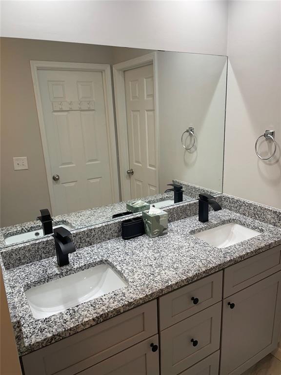2166 Lake Ridge Ter, Lawrenceville, GA 30043 - bathroom featuring double vanity