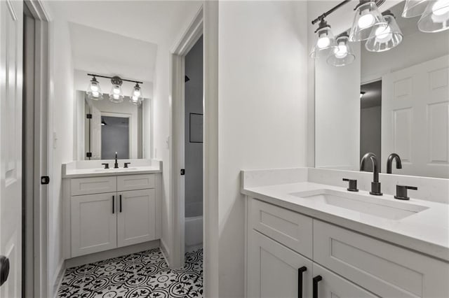 bathroom with shower / bathing tub combination and vanity