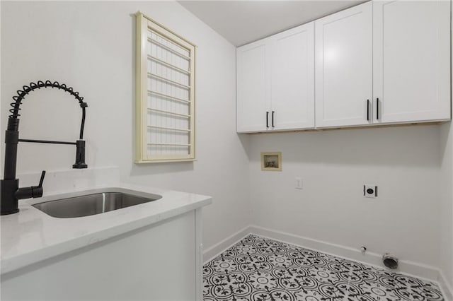 laundry area featuring cabinets, sink, washer hookup, light tile patterned floors, and hookup for an electric dryer