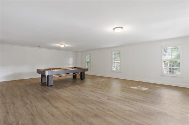 playroom with ornamental molding, light hardwood / wood-style floors, and billiards