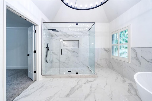 bathroom featuring separate shower and tub and lofted ceiling