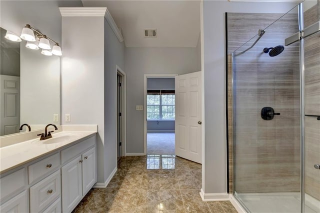 bathroom with vanity and an enclosed shower