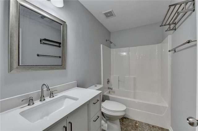 full bathroom featuring vanity, toilet, and  shower combination