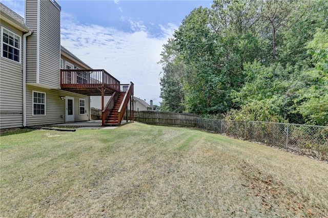 view of yard featuring a deck