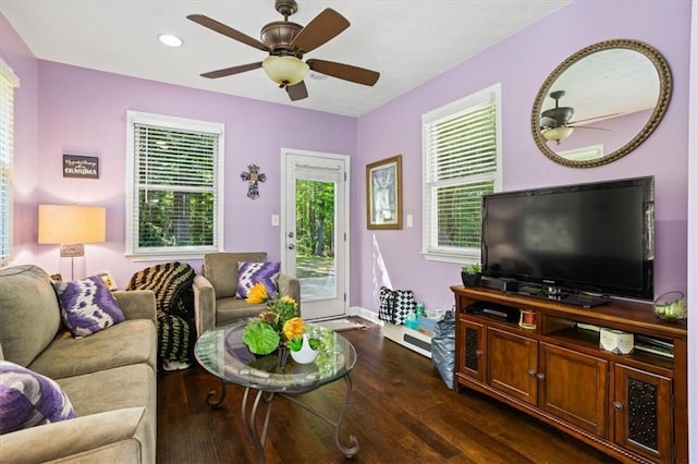 living area with ceiling fan, dark wood finished floors, plenty of natural light, baseboards, and recessed lighting