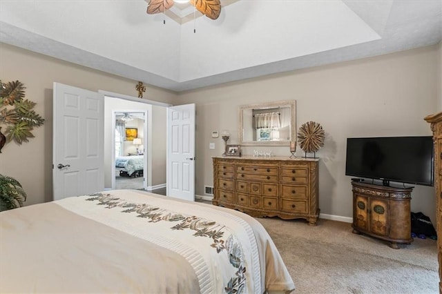 carpeted bedroom featuring a ceiling fan and baseboards