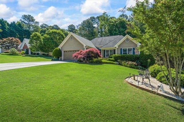 ranch-style home with driveway, an attached garage, and a front yard