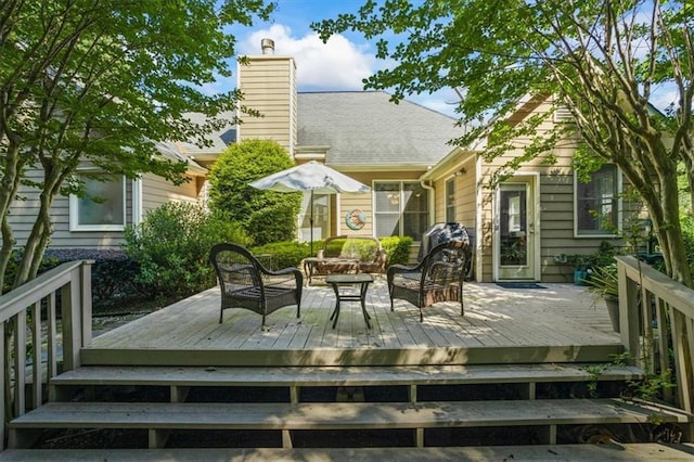 deck with an outdoor hangout area