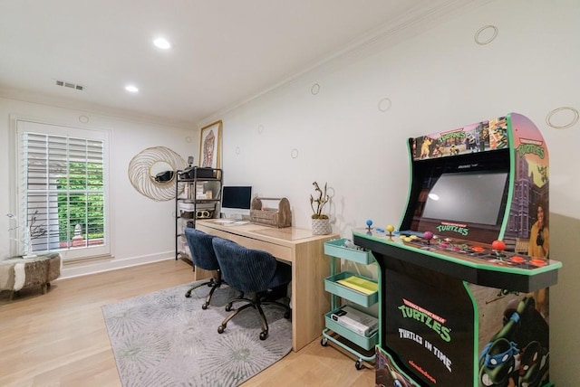 home office with crown molding, recessed lighting, wood finished floors, and visible vents