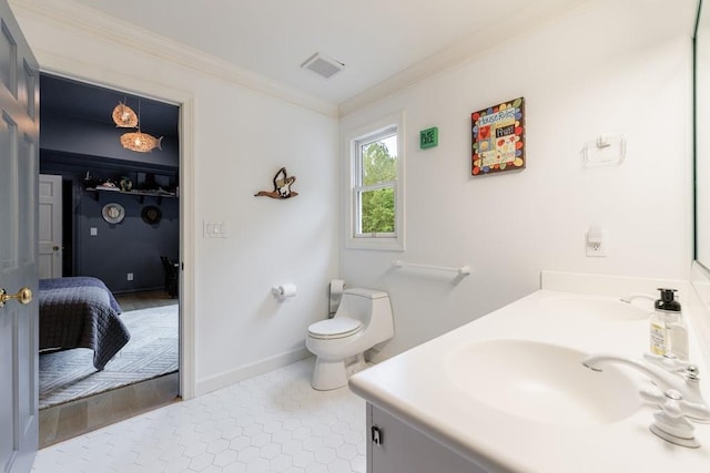 ensuite bathroom featuring vanity, toilet, ensuite bathroom, visible vents, and ornamental molding