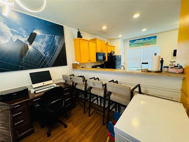 office area with dark wood-type flooring