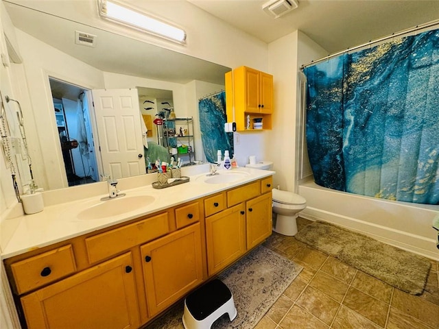 full bathroom with tile patterned floors, toilet, shower / bathtub combination with curtain, and double sink vanity