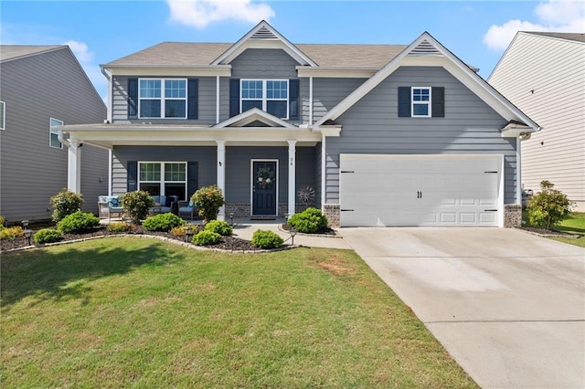 34 Hemlock Gln, Dallas, GA 30132 - craftsman-style home featuring driveway, covered porch, a front yard, and an attached garage