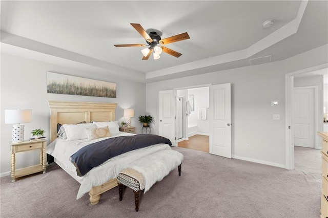 34 Hemlock Gln, Dallas, GA 30132 - bedroom featuring a raised ceiling, carpet, baseboards, ensuite bathroom, and ceiling fan